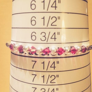 January Garnet Swarovski Crystal Birth Month Sterling Silver Plated Bracelet on bracelet measuring cone