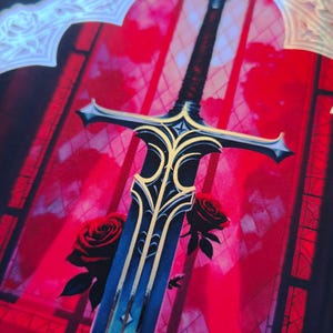 May include: A fantasy-themed illustration featuring a sword with a blue blade and gold accents. The sword is set against a red background with a stained-glass window design and two red roses. The image has a gothic aesthetic.