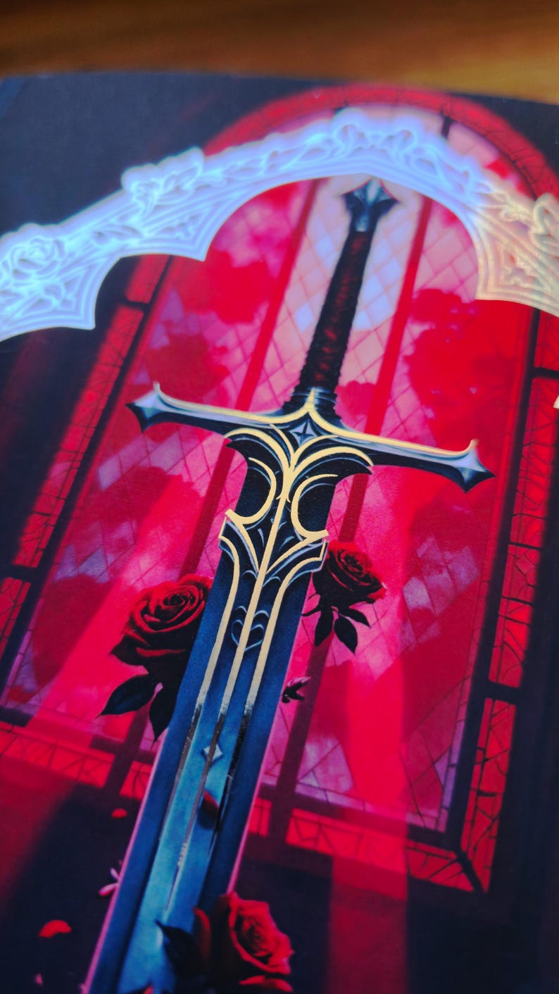 May include: A fantasy-themed illustration featuring a sword with a blue blade and gold accents. The sword is set against a red background with a stained-glass window design and two red roses. The image has a gothic aesthetic.