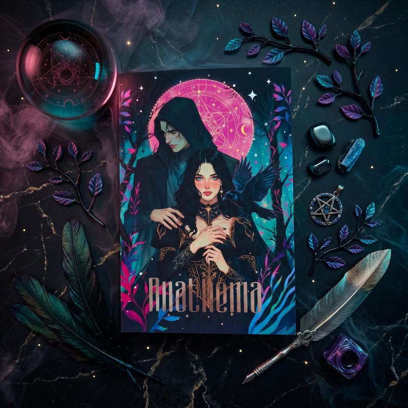 May include: A book cover with the title "Anathema" featuring a couple in dark attire against a pink moon backdrop. The image is surrounded by decorative elements like a crystal ball, crystals, a pentagram pendant, and a quill.