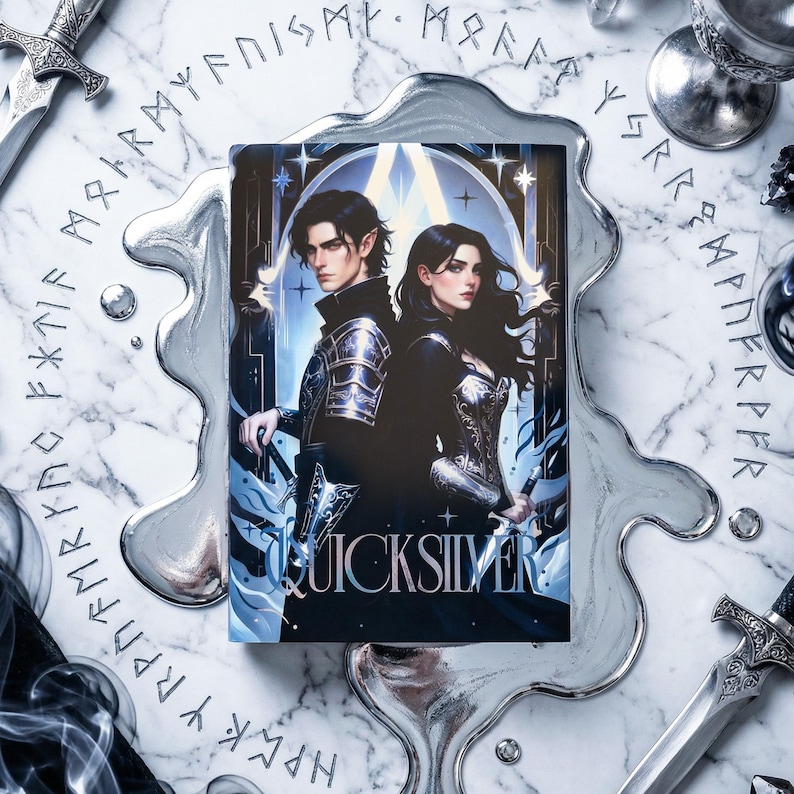 May include: A book cover featuring a male and female fantasy character with dark hair and armor. The title "QUICKSILVER" is displayed at the bottom. The background is a marble-like surface with silver decorative elements and swords.