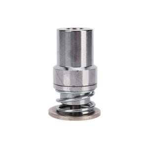 May include: A cylindrical silver-coloured metal component featuring a smooth upper section and a wider base. A coiled metal spring is positioned between the central body and a flat circular disc at the bottom, creating a mechanical assembly.