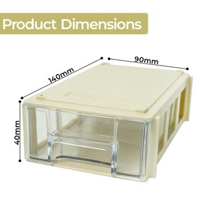 May include: A beige plastic storage drawer with a clear front. The dimensions are 14cm x 9cm x 4cm. The text "Product Dimensions" is at the top of the image.