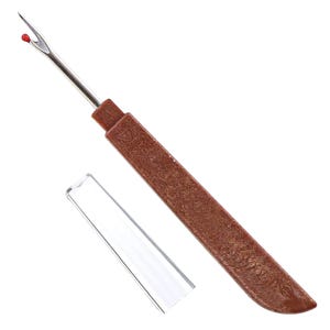 May include: A brown seam ripper with a textured handle and a silver blade. The blade has a red ball at the tip. A clear plastic cover is included to protect the blade.