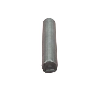 May include: A cylindrical, grey metal tool with a square opening at one end. The tool has a smooth, matte finish and appears to be made of solid steel. The shape suggests it is a socket wrench extension or similar tool.