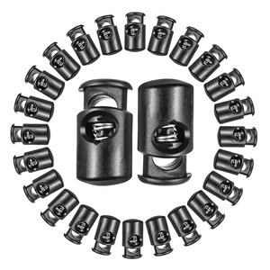 Fermacorda in plastica con chiusura a levetta per cordini, abbigliamento e zaini.