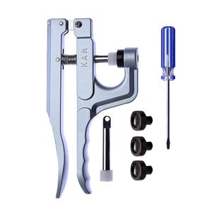 May include: A silver metal tool with a handle and a lever for setting eyelets. The tool is accompanied by three black eyelets and a small screwdriver with a blue handle.
