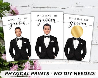May include: Three white cards with black text that reads "Who has the groom?" Each card features a different image of a man in a black tuxedo. One card has a gold circle covering the man's face.
