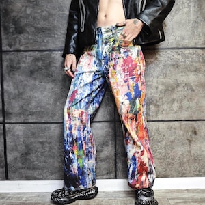 Express your bold style with these unisex paint splatter jeans, featuring vibrant colors and an edgy artistic vibe. Perfect for streetwear fans, skaters, festival goers, and creatives who love standout fashion. These jeans blend comfort with individuality, making them ideal for concerts, parties, raves, or everyday wear. A must-have for Y2K, grunge, and alternative fashion lovers seeking a unique wardrobe staple that turns heads and sets trends.