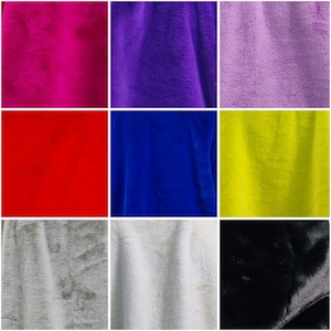 May include: Nine squares of plush fabric in various colors. The colors include hot pink, purple, light purple, red, blue, lime green, gray, white, and black. The fabric has a soft, fuzzy texture.
