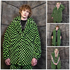 May include: A green and black checkered faux fur coat with a hood. The coat is worn by a person with curly hair, and is paired with matching trousers. Additional images show the coat worn by other people.