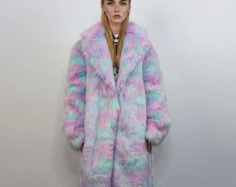 May include: A long, faux fur coat in pastel colors of pink, blue, and purple. The coat has a wide collar and long sleeves. The coat is knee-length and appears to be made of a soft, fluffy material.