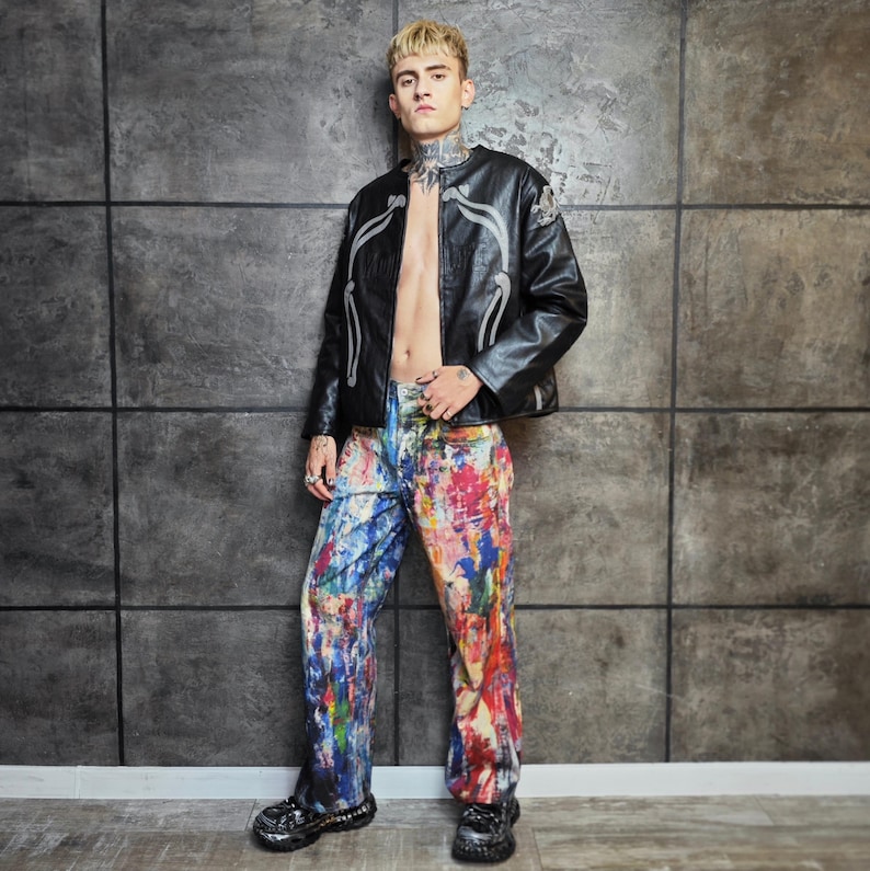 Express your bold style with these unisex paint splatter jeans, featuring vibrant colors and an edgy artistic vibe. Perfect for streetwear fans, skaters, festival goers, and creatives who love standout fashion. These jeans blend comfort with individuality, making them ideal for concerts, parties, raves, or everyday wear. A must-have for Y2K, grunge, and alternative fashion lovers seeking a unique wardrobe staple that turns heads and sets trends.