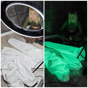 This UV Reactive Parka is the ultimate Cyber Rave statement. Designed for high-impact visibility at warehouse parties and outdoor Festivals, the Bioluminescent effect ensures you stand out in the dark. It features a deep hood for that mysterious "afterhours" look. Pro Tip: Keep the glow strong by standing near a blacklight for a few minutes to "recharge" your brightness throughout the night. Essential gear for Hardstyle, Industrial, and Trance fans.
