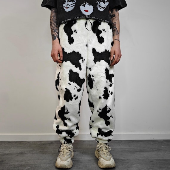 Cow Print Faux Fur Joggers, Black White Shaggy Animal Pants