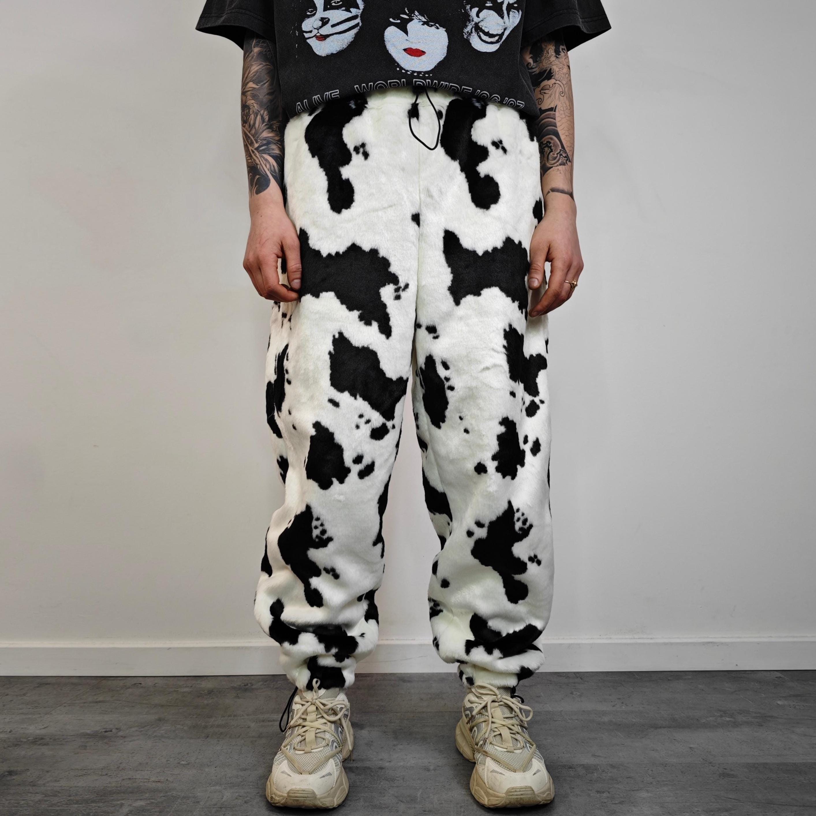 Cow Print Faux Fur Joggers, Black White Shaggy Animal Pants