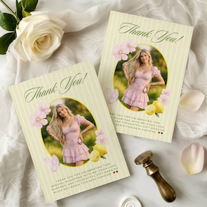 May include: Two yellow and white striped "Thank You!" cards with a photo of a woman in a pink dress, surrounded by pink flowers, lemons, and butterflies. A gold wax seal and stamp are also visible.