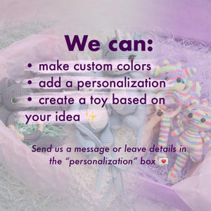 May include: Crocheted toys in a box with text that reads "We can: make custom colors, add a personalization, create a toy based on your idea." The toys are in various colors, including blue, gray, and rainbow.