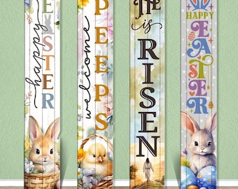May include: Four wooden Easter signs with different messages. The signs are painted white with colorful floral designs and feature bunnies, chicks, and religious imagery. The signs read "Happy Easter", "Welcome Peeps", "He is Risen", and "Happy Easter".