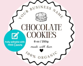 May include: A round label with a scalloped edge, featuring the text "YOUR BUSINESS NAME" and "CHOCOLATE COOKIES." It includes a drawing of two cookies, the text "8 oz / 250g," and "100% ORGANIC." A teal circle with a pencil icon and the words "Fully editable with FREE Canva" is on the left.