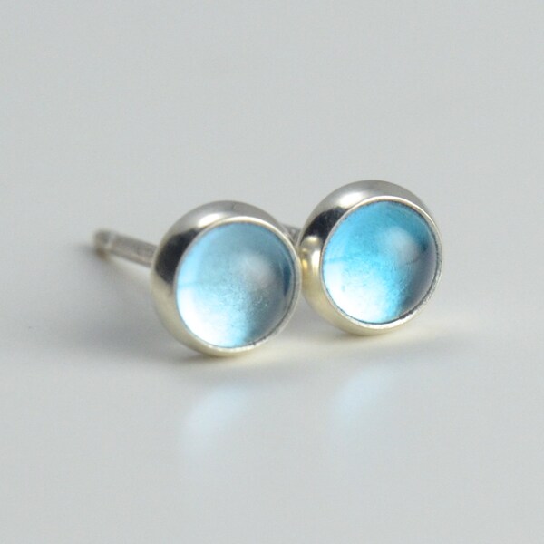 swiss blue topaz 4mm sterling silver stud earrings