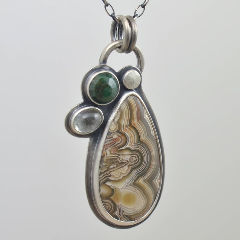 crazy lace agate emerald and tourmaline sterling silver pendant necklace