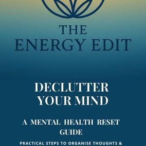 May include: A book cover with a gradient background of yellow and blue. The title reads "The Energy Edit" with a lotus flower graphic above. Below, the text says "Declutter Your Mind" and "A Mental Health Reset Guide". Includes mindfulness and journaling exercises.
