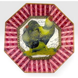 May include: An octagonal decorative plate with a rooster and hen illustration. The plate features a red and white striped border and a gold trim. The rooster and hen are yellow, black, and green, with text in the center.
