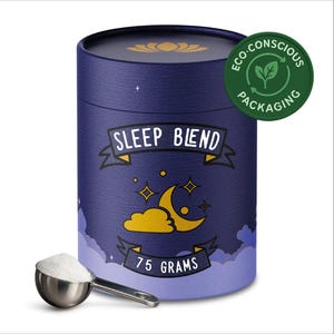May include: A cylindrical container of Sleep Blend tea with a navy blue background and a gold crescent moon and stars design. The container has the text "Sleep Blend" and "75 grams". A silver scoop with white powder is in front of the container. An "Eco-Conscious Packaging" sticker is on the container.