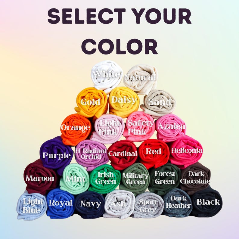 Op de afbeelding: Een piramide van opgerolde stof in verschillende kleuren, waaronder wit, goud, oranje, paars, rood en zwart. Elke rol is gelabeld met zijn kleurnaam, zoals "Wit", "Goud" en "Zwart". De tekst "SELECT YOUR COLOR" staat bovenaan.
