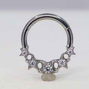 Titanium ASTM F136 (cl93) Zirkonia-sterren klikkerring 1,2 mm (16ga) Geschikt voor Daith, Helix, Kraakbeen, Septum, Rook, Lobe