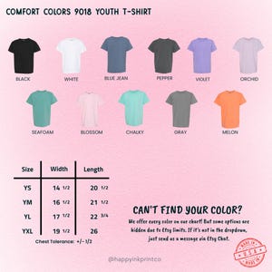 May include: Comfort Colors 9018 youth t-shirt color chart featuring eleven short-sleeve shirts in black, white, blue jean, pepper, violet, orchid, seafoam, blossom, chalky, gray, and melon. Includes a size chart with width and length in inches.