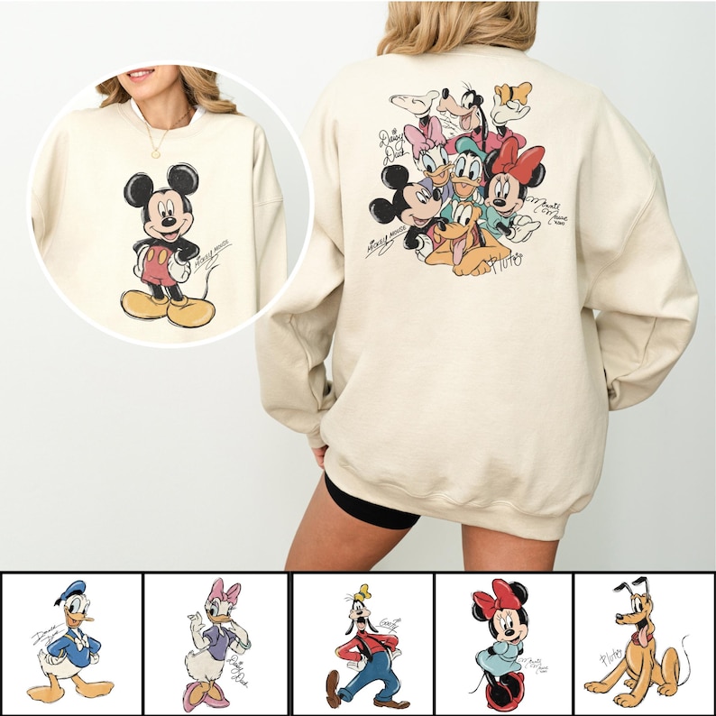 May include: Cream-colored sweatshirt featuring Mickey Mouse on the front and a group of Disney characters on the back. The front graphic shows Mickey in his classic pose. The back displays Mickey, Minnie, Donald, Daisy, Goofy, and Pluto. The sweatshirt has a relaxed fit.