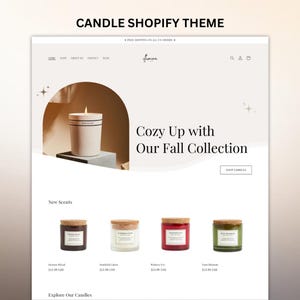 May include: A website design for a candle shop. The page features a lit candle, and the text "Cozy Up with Our Fall Collection." Below are four candles in glass jars with cork lids, each with a different colored wax.