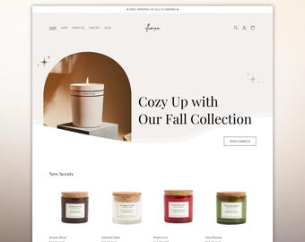May include: A website design for a candle shop. The page features a lit candle, and the text "Cozy Up with Our Fall Collection." Below are four candles in glass jars with cork lids, each with a different colored wax.