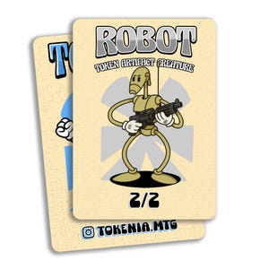 May include: Two trading cards with a vintage cartoon robot design. The card on the right features a tan robot holding a black gun, with the word "ROBOT" above it. The text "TOKEN ARTIFACT CREATURE" is below the word "ROBOT". The card has the number "2/2" at the bottom.