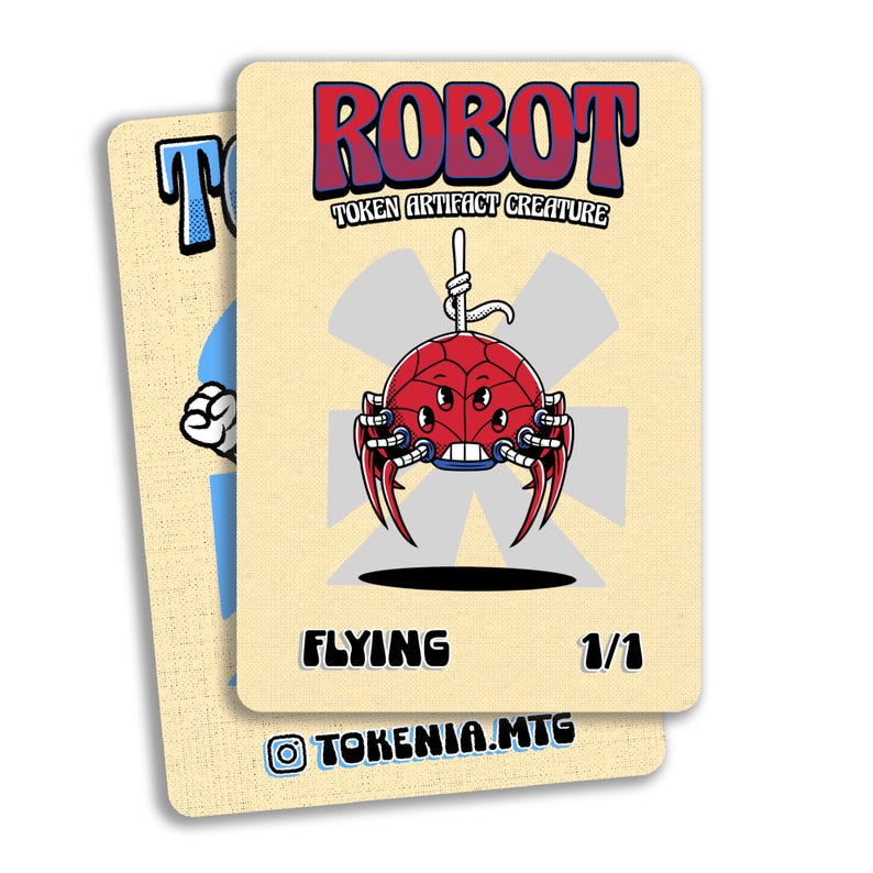 May include: Two trading cards with a cartoon robot design. The primary card features a red robot with multiple eyes and sharp claws, the word "ROBOT" in a bubble font, and the text "TOKEN ARTIFACT CREATURE". The card also says "FLYING" and "1/1". The second card has a blue cartoon character.