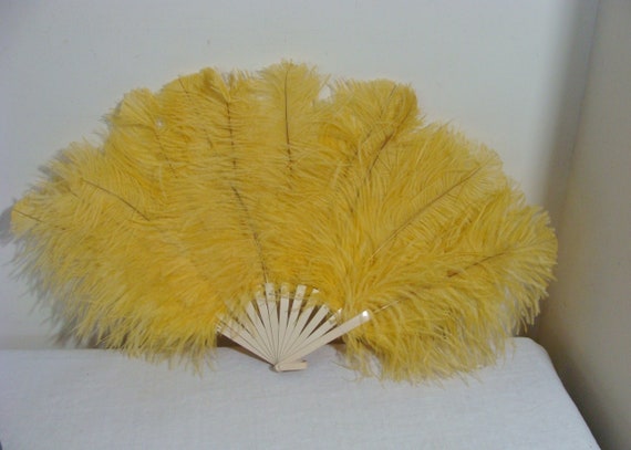 Antique Celluloid & Yellow Ostrich Feather Fan