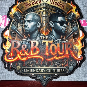 May include: A patch featuring Chris Brown and Usher, with the text "The R&B Tour" and "Legendary Cultures." The design includes flames, microphones, and a gold banner. The patch is on a gray background.