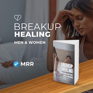 May include: A white book titled "Breakup Healing: Embracing Self-Care After a Breakup" on a wooden table. The book cover features a woman with her head in her hands, and a man sitting in the background.