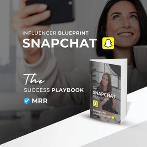 May include: A yellow and white book titled "The Snapchat Playbook: Strategies for Influencer Success" with a yellow Snapchat ghost logo. The book is on a white surface.