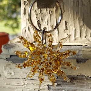 Sun with gold flakes keychain