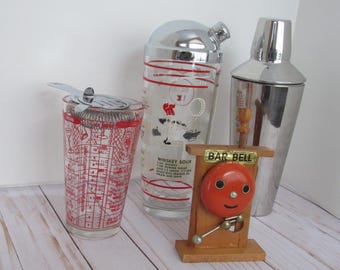 Set of 1960's retro drink shakers and bar bell