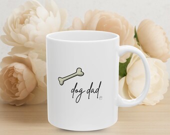 Dog Dad Mug: White Ceramic Coffee Cup with Dog Bone Design