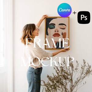 May include: A woman hangs a framed abstract painting on a white wall. The painting features a woman's face with colorful abstract shapes. The text "FRAME MOCKUP" is superimposed on the image.
