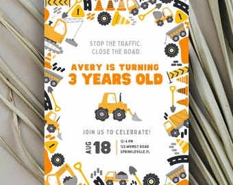 May include: A birthday party invitation with a construction theme. The invitation features illustrations of construction vehicles, road signs, and cones in yellow, gray, and black. The text reads "Avery is turning 3 years old" and includes party details.
