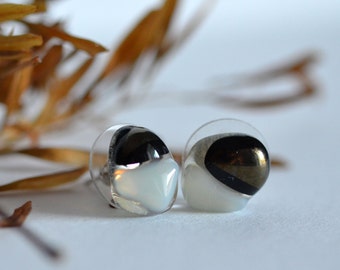 Iridescent cream and black glass stud earrings