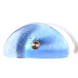 May include: A light blue, semi-circular glass bottle stopper with a silver metal screw. The glass has a bubbly texture and a white cord attached. The stopper is designed to seal bottles.