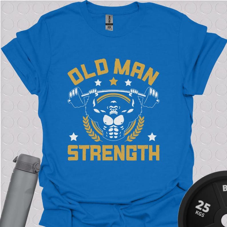 May include: A blue t-shirt with a graphic of a gorilla lifting weights. The text "Old Man Strength" is printed in yellow on the shirt.