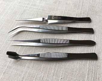 Tweezer 4 piece stainless steel set, reverse action, curved, strong tip and flat and wide